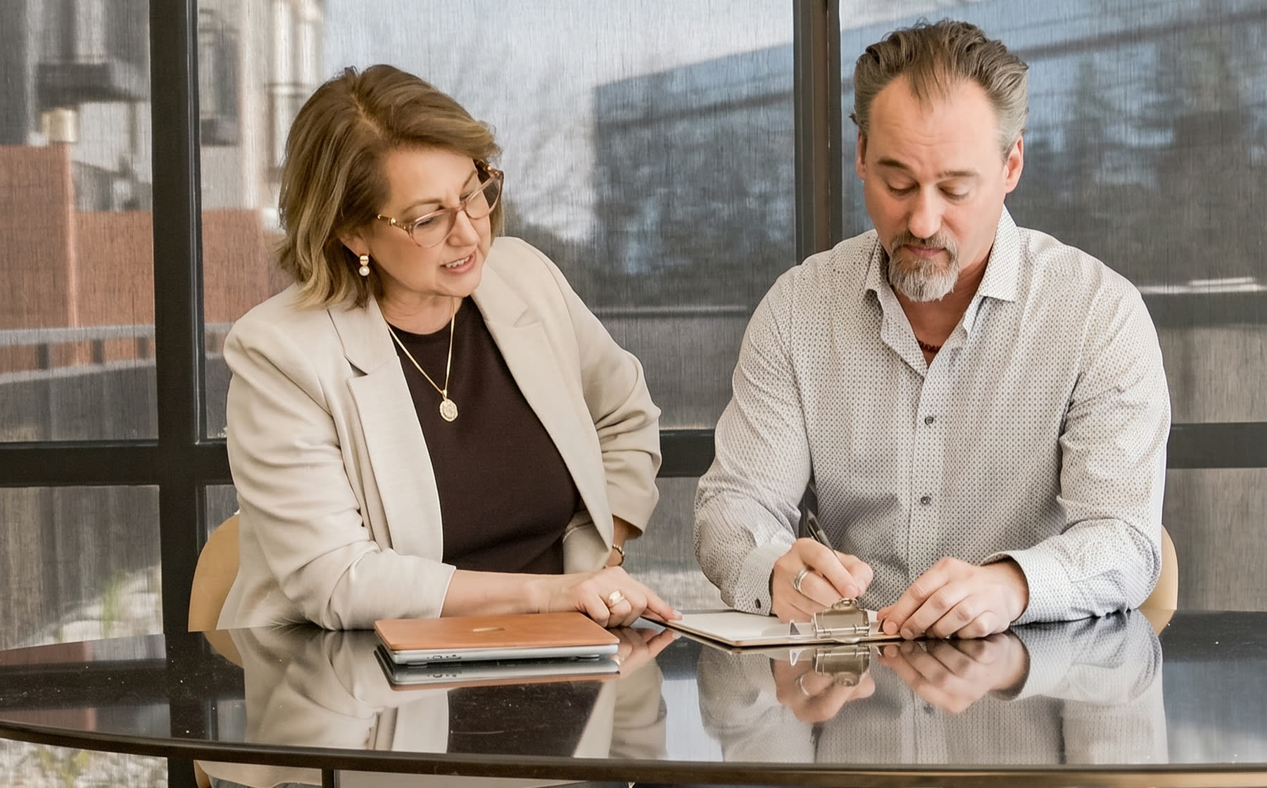 Two Marketly strategists working through a dental growth plan